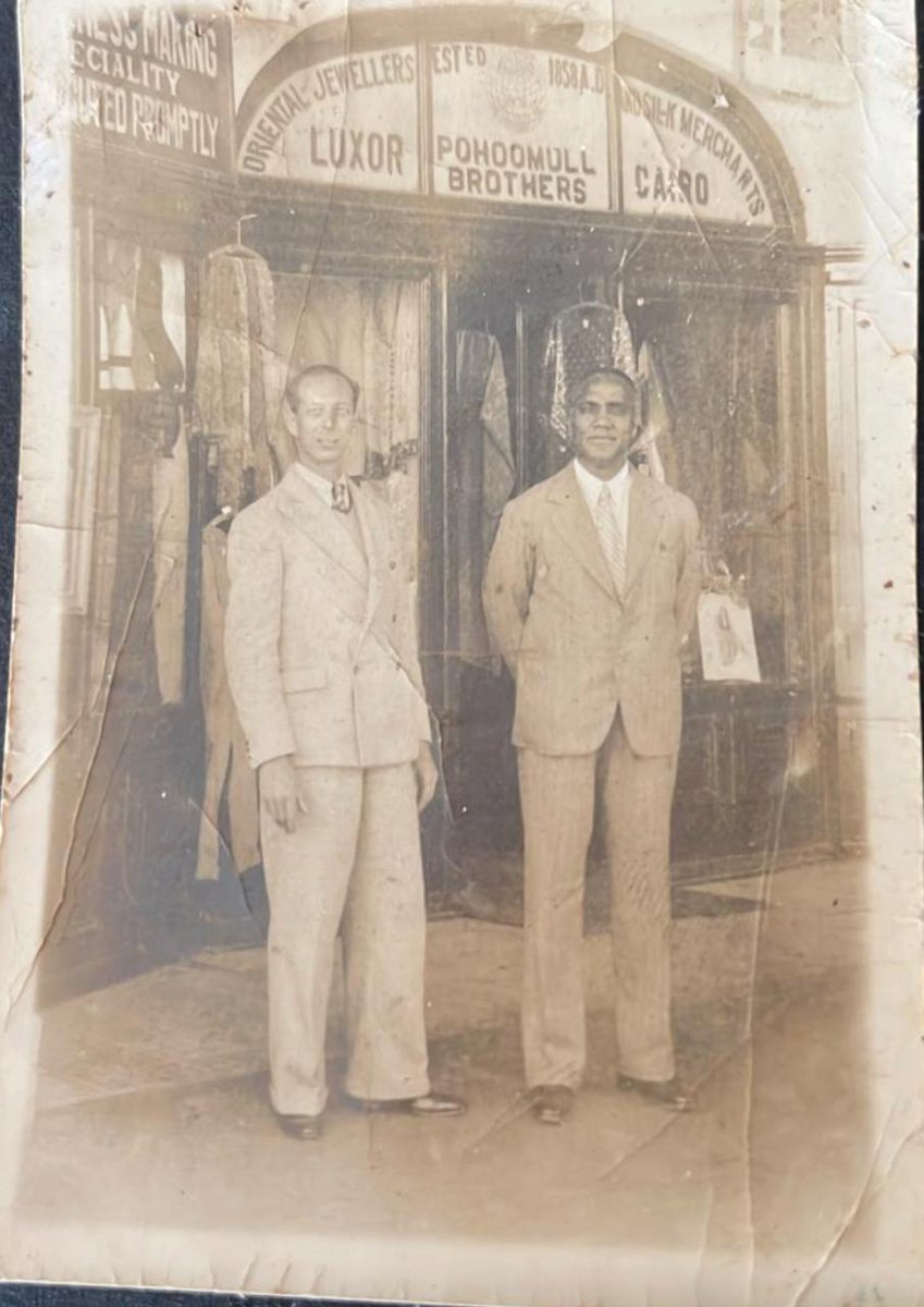 Two men outside the Luxor/Cairo store